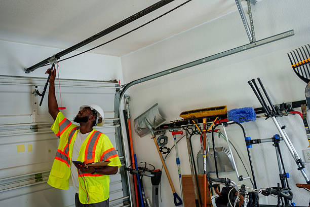 Professional Garage Door Panel Replacement technician working in Garland, UT